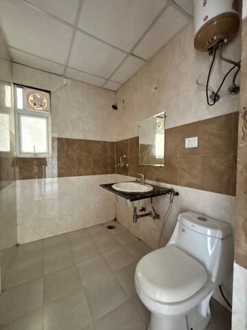 Bathroom in 3 BHK Apartment at Amrapali Golf Homes, Sector 4 Greater Noida – for Rent