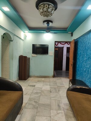 Living Room in 1 BHK Apartment at Kachnar CHS Vasant Vihar, Vasant Vihar – for Rent