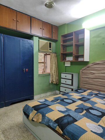 Bedroom in 1 BHK Apartment at Kachnar CHS Vasant Vihar, Vasant Vihar – for Rent