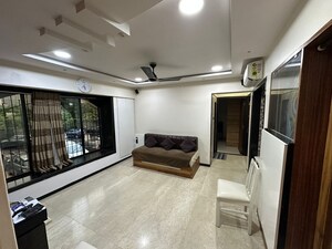 Living Room in 4 BHK Apartment at Amal Pushp Vatika, Khar West – for Sale