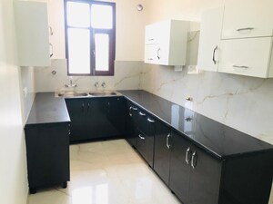 Kitchen in 3 BHK Builder Floor at Dhakoli – for Rent