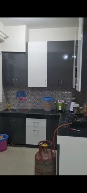 Kitchen in 2 BHK Apartment at Raj Nagar Extension – for Sale