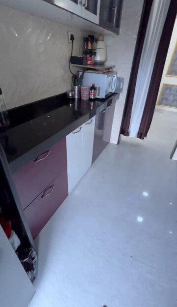 Kitchen in 2 BHK Apartment at Mahakali Nagar – for Sale
