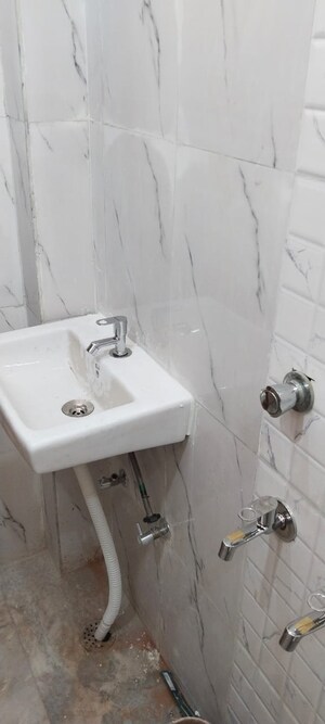 Bathroom in 1.5 BHK Builder Floor at Okhla Industrial Estate Phase 2 – for Sale