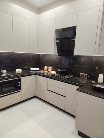 Kitchen in 4 BHK Apartment at Adani Samsara Ivana, Sector 63 – for Sale