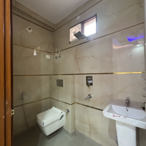 Bathroom in 3 BHK Builder Floor at Dwarka Mor – for Rent