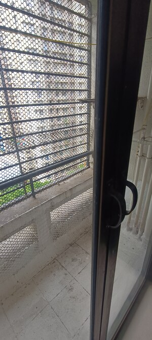 Balcony in 2 BHK Apartment at Living Essence, Kandivali East – for Rent