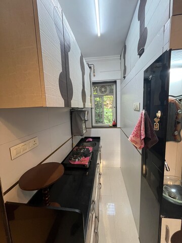 Kitchen in 1.5 BHK Apartment at Seven Bunglow – for Rent