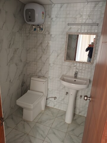 Bathroom in 1 BHK Apartment at Chi V Greater Noida – for Sale