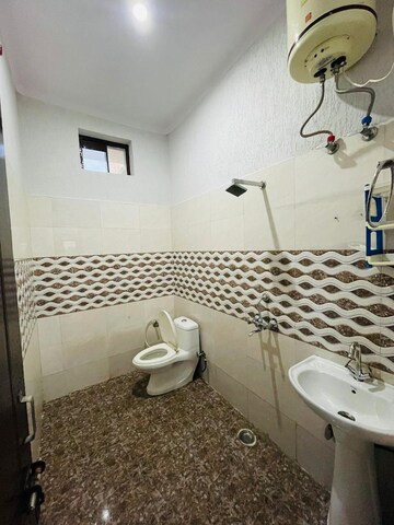 Attached Bathroom in 3 BHK Builder Floor at Bhagirathi Puram – for Sale