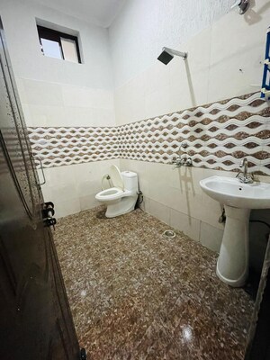 Bathroom in 3 BHK Builder Floor at Bhagirathi Puram – for Sale
