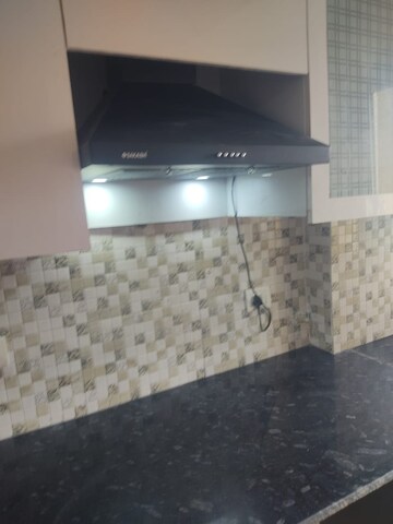 Kitchen in 2 BHK Apartment at Gardenia Gateway, Sector 75 – for Rent