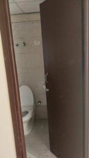 Bathroom in 2 BHK Apartment at Raj Nagar Extension – for Sale
