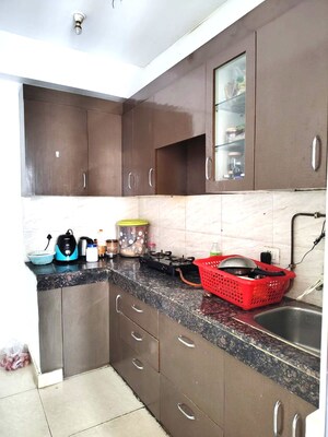 Kitchen in 2 BHK Apartment at Ajnara Le Garden, Sector 16b Greater Noida – for Sale