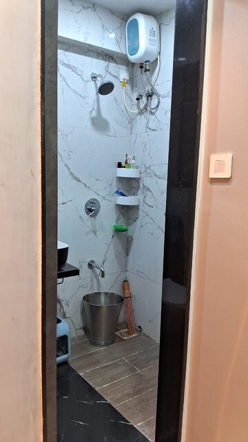 Bathroom in 2 BHK Apartment at Triumph Omkareshwar CHS, Borivali East – for Sale