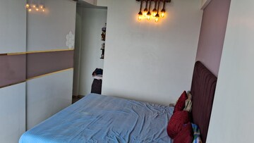 Bedroom in 2 BHK Apartment at Triumph Omkareshwar CHS, Borivali East – for Sale