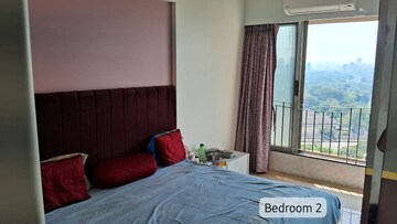 Bedroom in 2 BHK Apartment at Triumph Omkareshwar CHS, Borivali East – for Sale