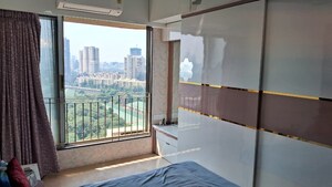 Room in 2 BHK Apartment at Triumph Omkareshwar CHS, Borivali East – for Sale