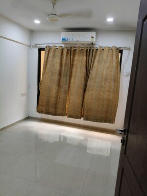 Bedroom in 2 BHK Apartment at RNA NG Suncity Phase III, Kandivali East – for Rent