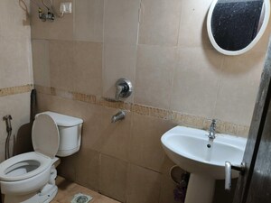 Bathroom in 2 BHK Apartment at RNA NG Suncity Phase III, Kandivali East – for Rent