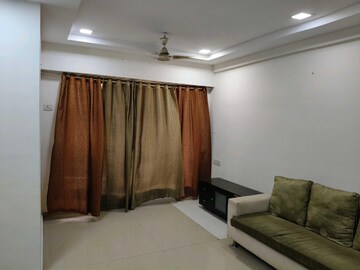 Living Room in 2 BHK Apartment at RNA NG Suncity Phase III, Kandivali East – for Rent