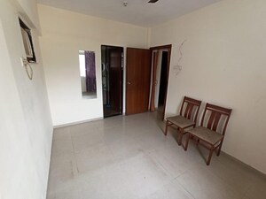 Living Room in 1 BHK Apartment at Bhoomi Hills, Kandivali East – for Rent