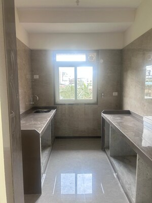 Kitchen in 3 BHK Apartment at Harshmaan Crescent Heights, Borivali West – for Sale