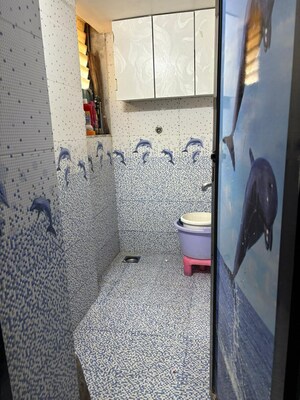 Bathroom in 1 BHK Apartment at Kanakia Sanskruti, Kandivali East – for Rent
