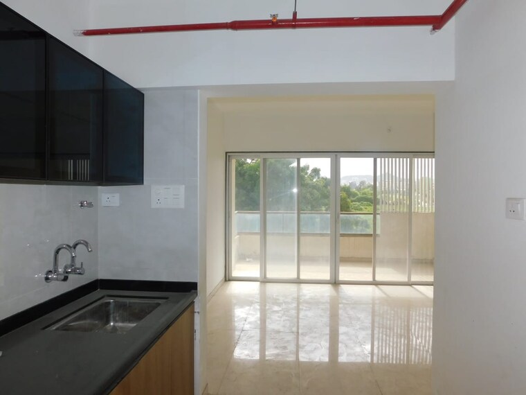 Kitchen, sukhwani-skylines 2 Bedroom 821 Sq.Ft. Apartment In Wakad Pune 9266370