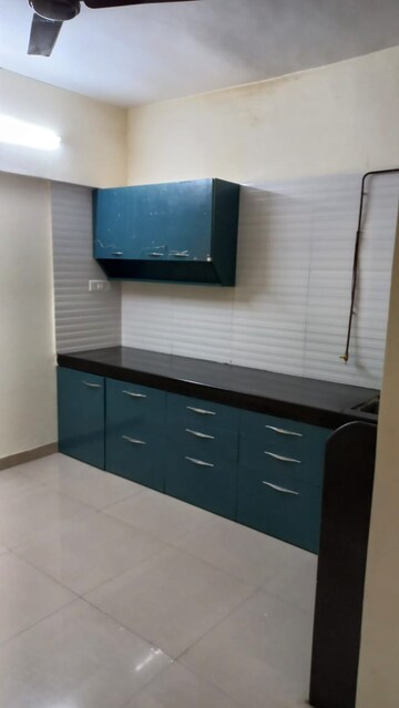 Kitchen in 3 BHK Apartment at Arun Sheth Sanskriti Phase III, Wakad – for Sale