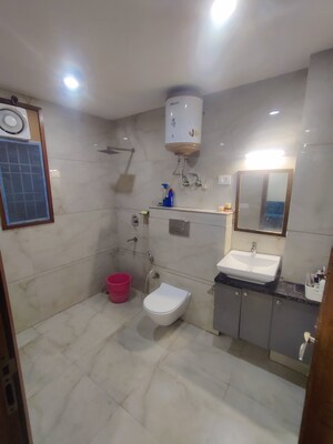 Bathroom in 3 BHK Apartment at Chattarpur – for Rent