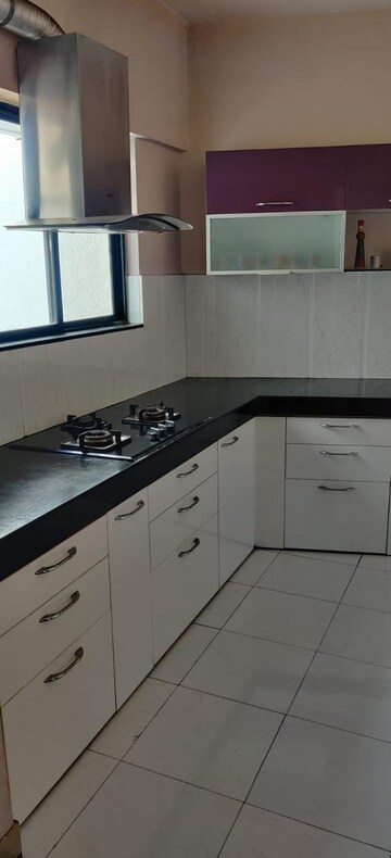 Kitchen in 2 BHK Apartment at Gera Emerald City, Kharadi – for Rent