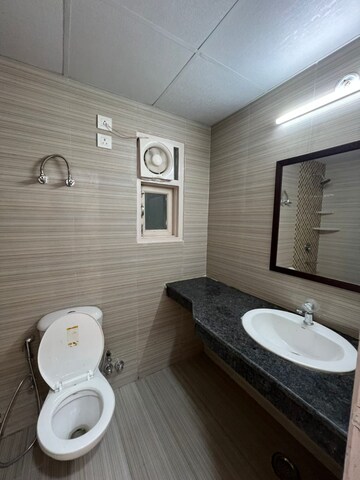 Bathroom in 3 BHK Apartment at Cosmos Express 99, Sector 99 – for Rent