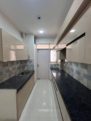 Kitchen in 3 BHK Apartment at Cosmos Express 99, Sector 99 – for Rent
