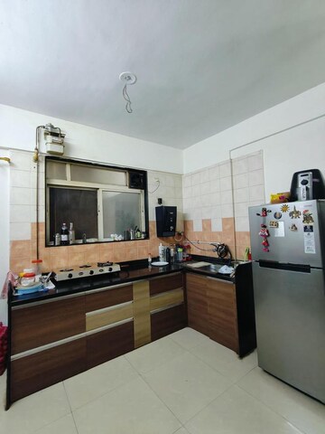 Kitchen in 2 BHK Apartment at Dwarka Sun Crest Phase I, Rahatani – for Sale
