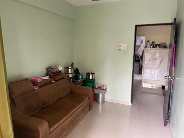 Living Room in 2 BHK Apartment at Jai Madhuban CHS, Kalyan West – for Rent