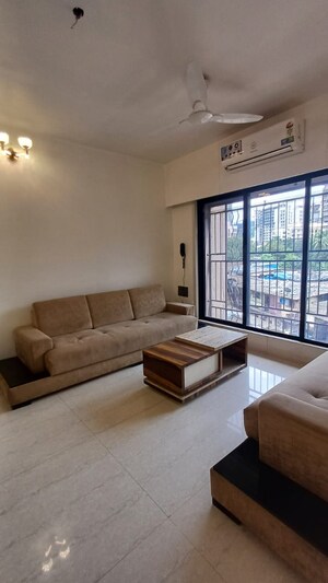 Living Room in 1 BHK Apartment at Harshail Falcon, Malad West – for Rent