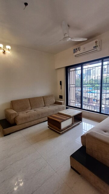 Living Room in 1 BHK Apartment at Harshail Falcon, Malad West – for Rent