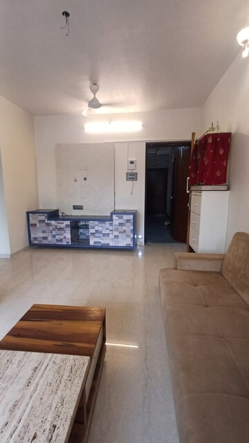 Living Room in 1 BHK Apartment at Harshail Falcon, Malad West – for Rent