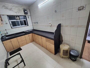 Kitchen in 1.5 BHK Apartment at Kamla Airbus, Andheri East – for Rent