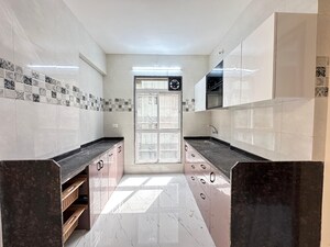 Kitchen in 2 BHK Apartment at Jai Madhuban CHS, Kalyan West – for Rent