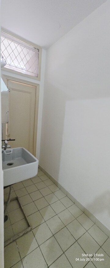 Bathroom in 4 BHK Builder Floor at Sarvodaya Enclave – for Rent