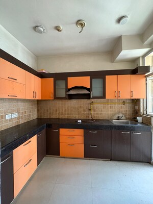 Kitchen in 3 BHK Apartment at Mahagun Mywoods, Sector 16c Greater Noida – for Rent