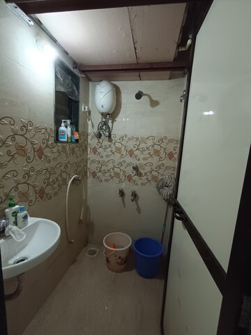 Attached Bathroom in 1 BHK Apartment at Bindra Complex, Andheri East – for Rent