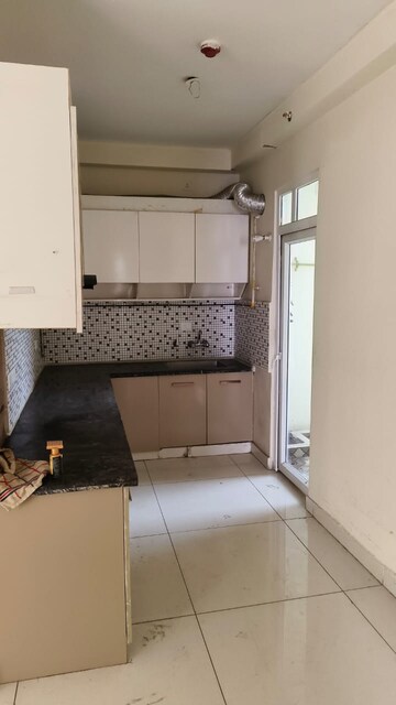 Kitchen in 2 BHK Apartment at Saya Gold Avenue, Vaibhav Khand – for Rent