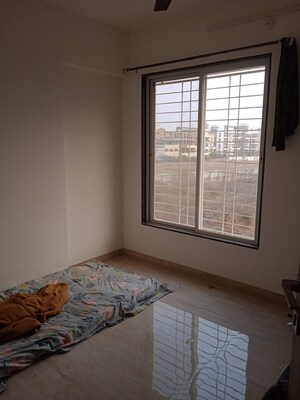 Room in 2 BHK Apartment at Shree Nidhi, Lohgaon – for Rent