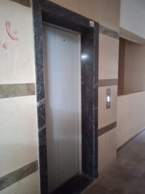 Building Lobby in 2 BHK Apartment at Shree Nidhi, Lohgaon – for Rent