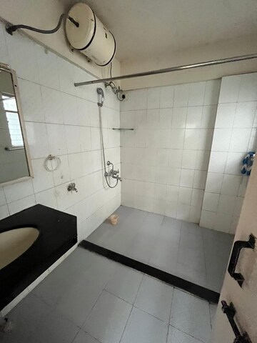 Bathroom in 1 BHK Apartment at Amrut Runwal Paradise, Kothrud – for Rent