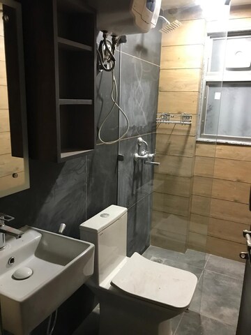 Bathroom in 3 BHK Builder Floor at Auram Floor, South City 2 – for Rent
