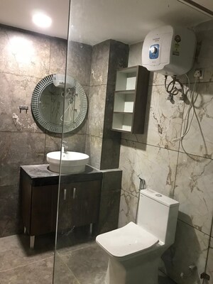 Bathroom in 3 BHK Builder Floor at Auram Floor, South City 2 – for Rent
